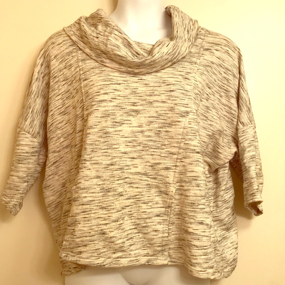 White, gray & black cotton sweat shirt like top.